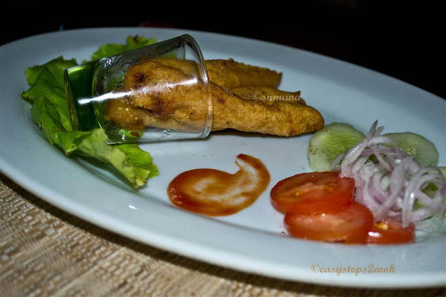 Baby corn fritters prepared by frying after dipping in a batter